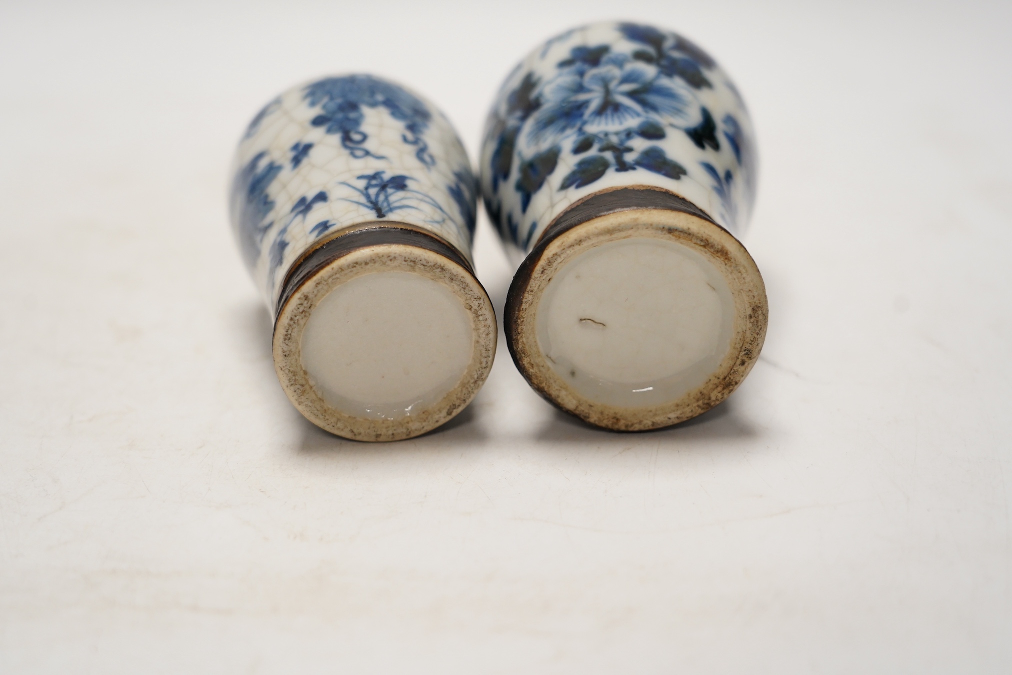 Chinese blue and white ceramics comprising crackle glaze vases and circular seal pots (4). Condition - fair to good, a few minor chips